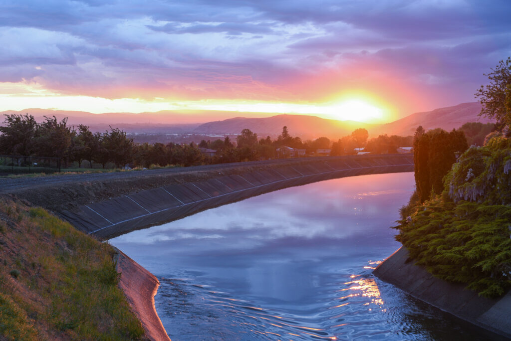 A view of an irrigation canal at sunset in Terrance Heights