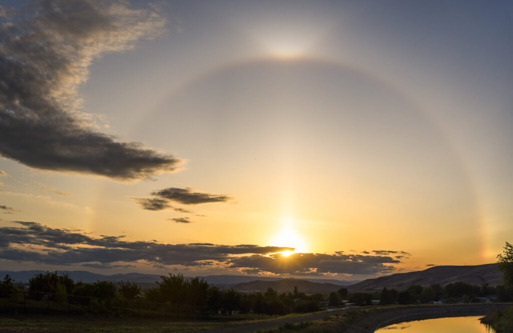 Halos in the sky over an irrigation canal in Terrance Heights